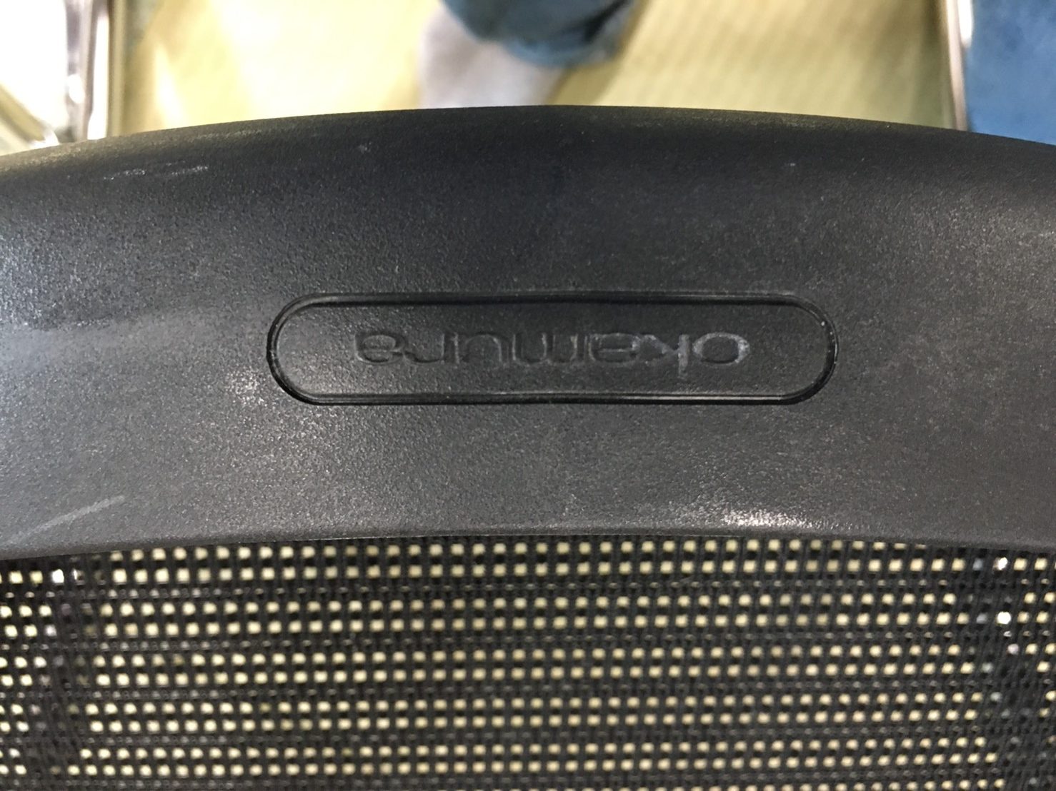 オカムラのロゴ